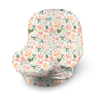 Itzy Ritzy peach floral mom boss against white backdrop 