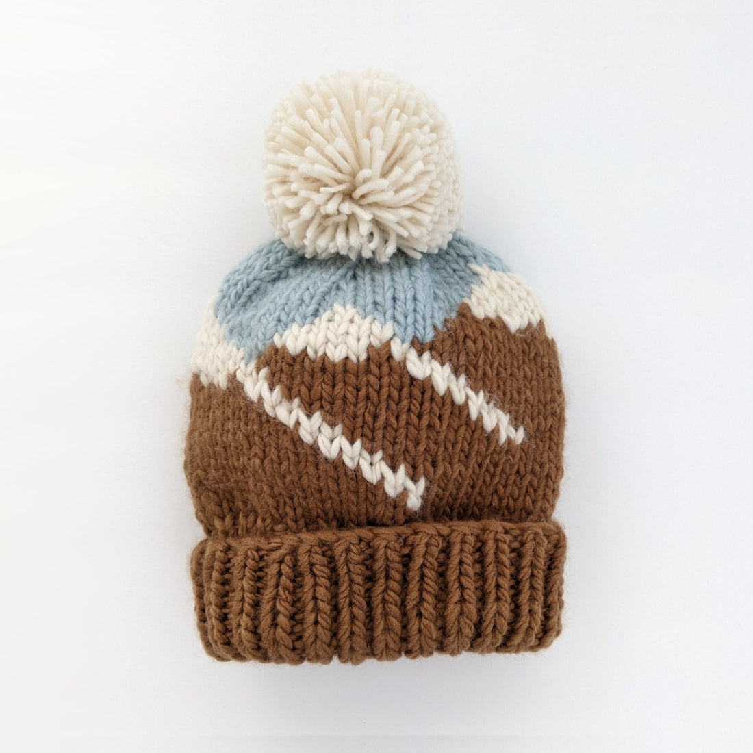 Huggalugs mountain hand knit beanie hat against white backdrop
