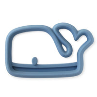 Itzy Ritzy whale silicone teether against white backdrop