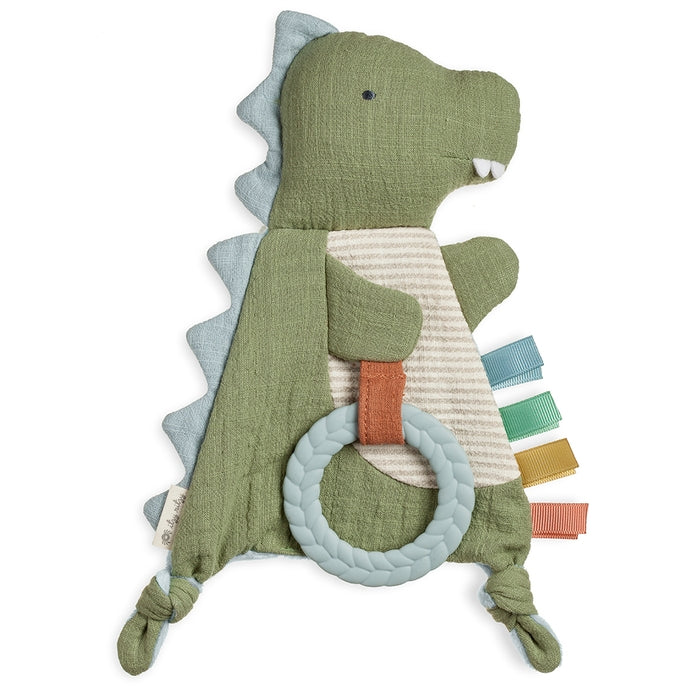 Itzy Ritzy dino bitzy crinkle sensory toy with teether against white backdrop