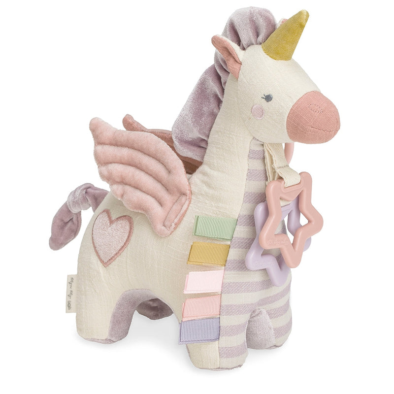 Itzy Ritzy activity plush pegasus with teether toy against white backdrop