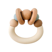 Pretty Please teethers multi color orbit teething ring against white backdrop