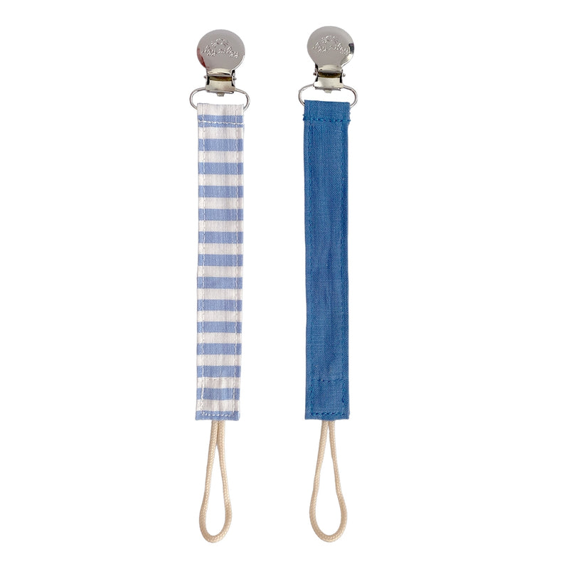 Ritzy Itzy Clip blue linen pacifier straps against white back